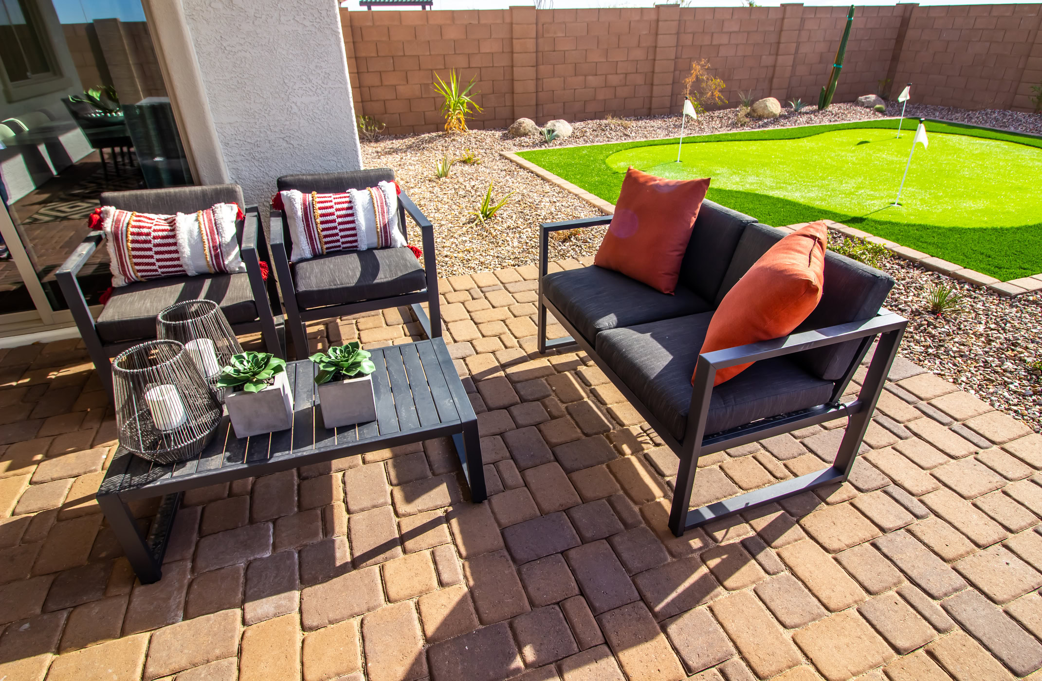 Already Have a Patio? How To Fit an Outdoor Putting Green Around It Without Redoing the Yard Already Have a Patio? How To Fit an Outdoor Putting Green Around It Without Redoing the Yard